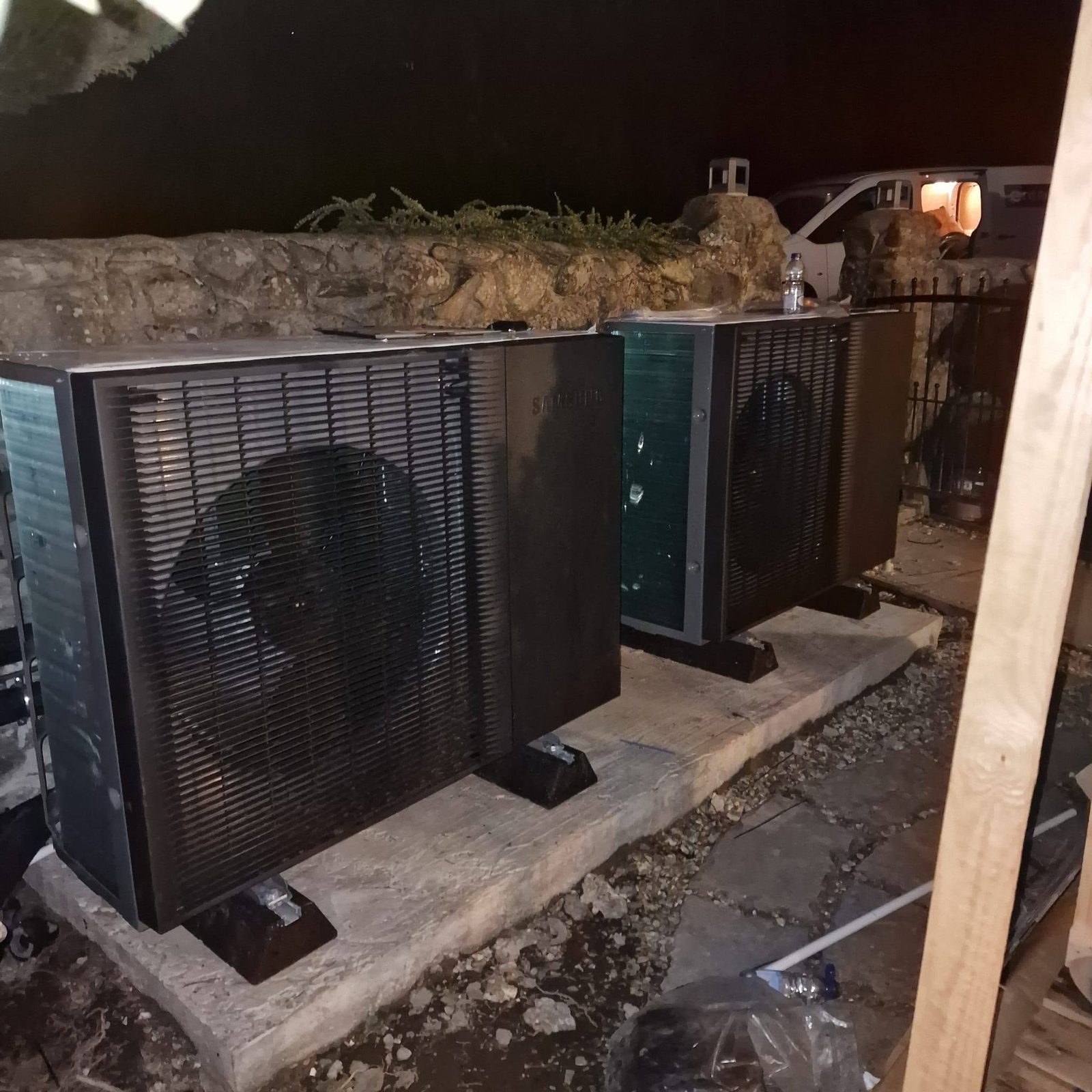 Samsung commercial outdoor AC units installed on a concrete plinth